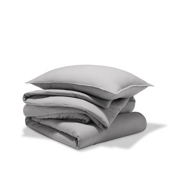A comforter set folded and stacked