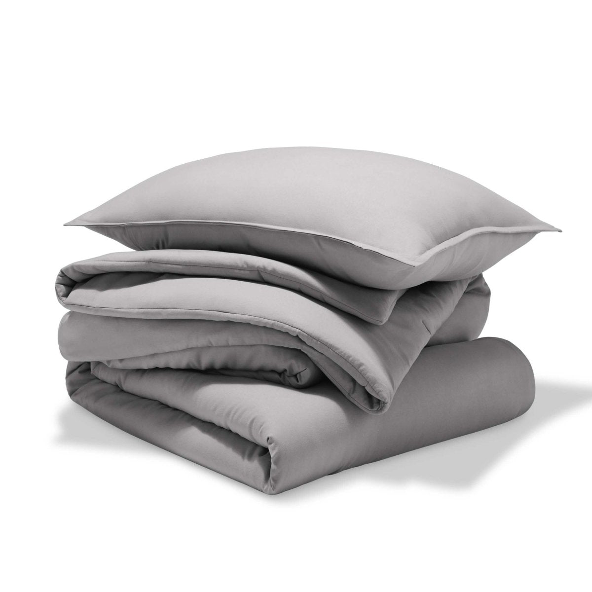 A comforter set folded and stacked