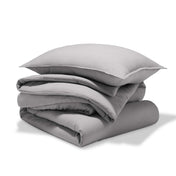 A comforter set folded and stacked