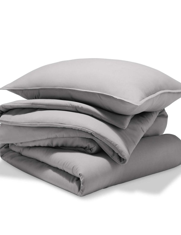 A comforter set folded and stacked
