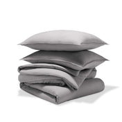 A comforter set folded and stacked