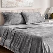 Microplush sheet set on a bed.