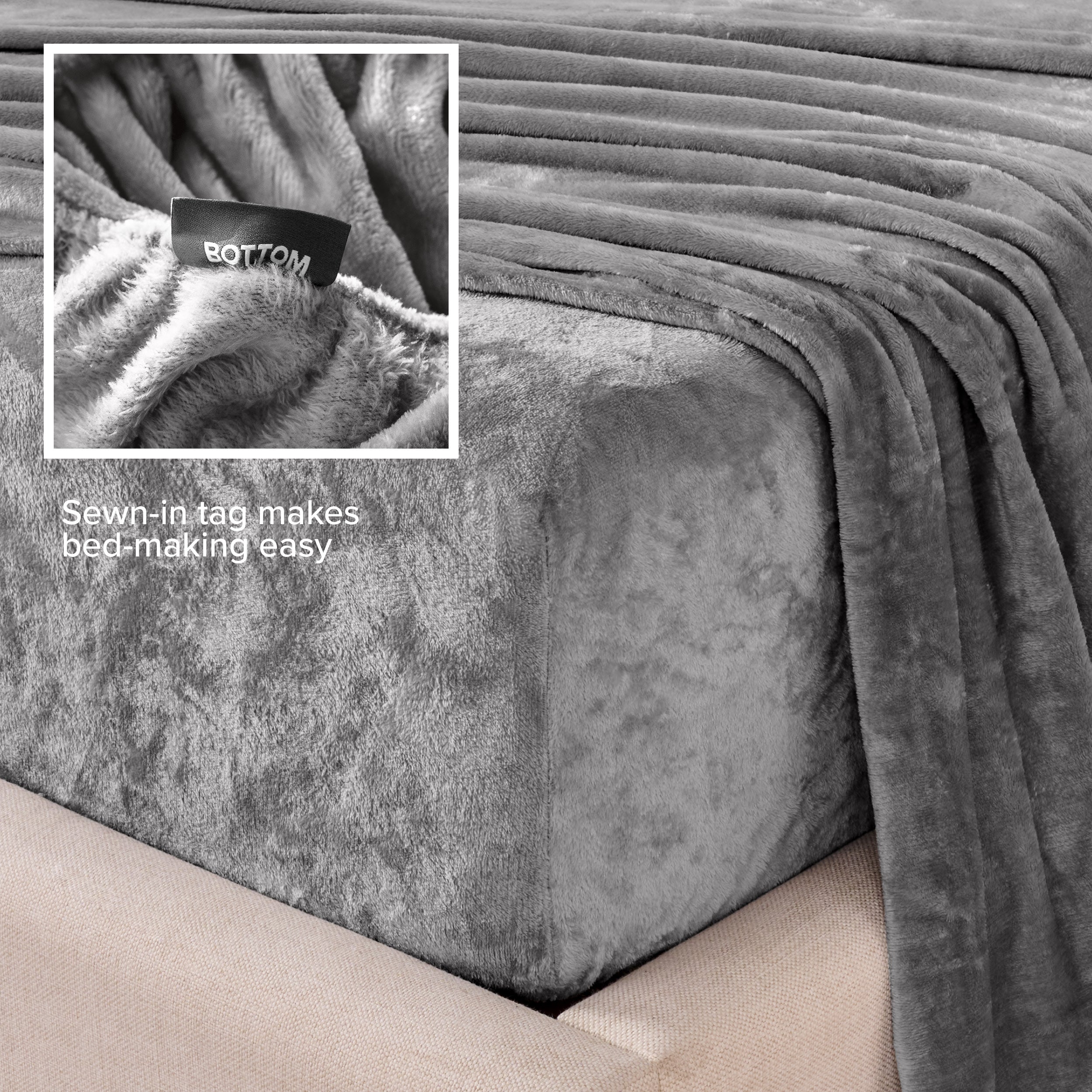 Close-up of the corner of a bed made with microplush sheets