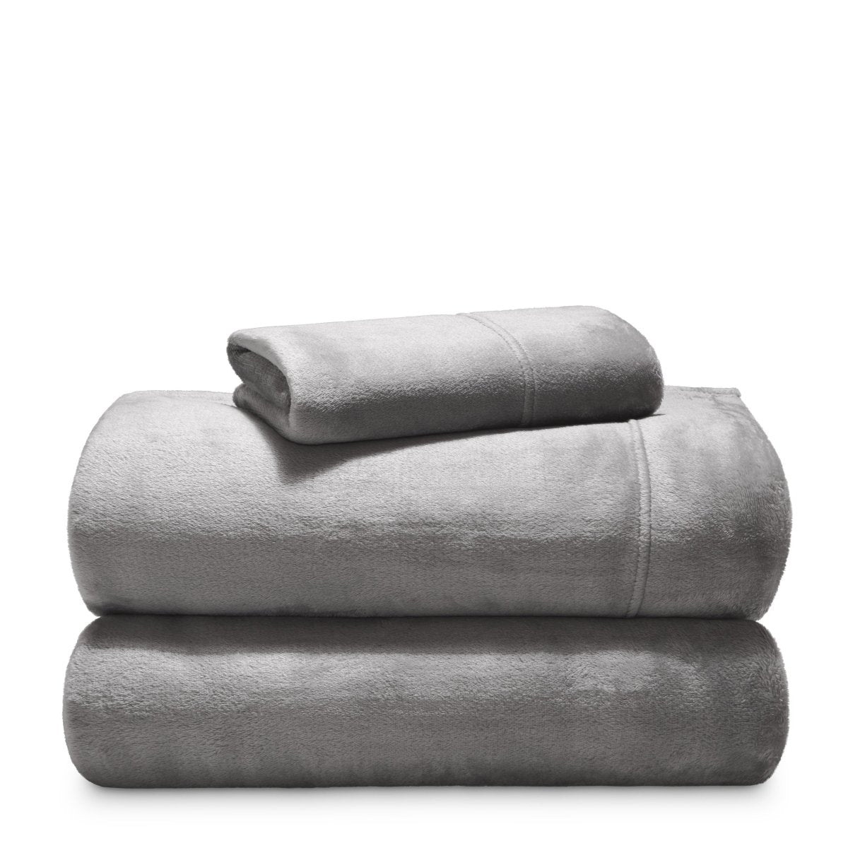 Stack of microplush sheets on a white background