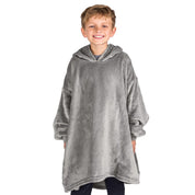 A boy dressed in a microplush wearable blanket.