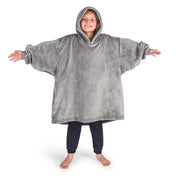 A boy wearing a cozy hooded blanket.