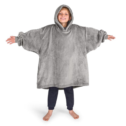 A boy wearing a cozy hooded blanket.