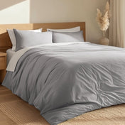 A bedroom with percale bedding