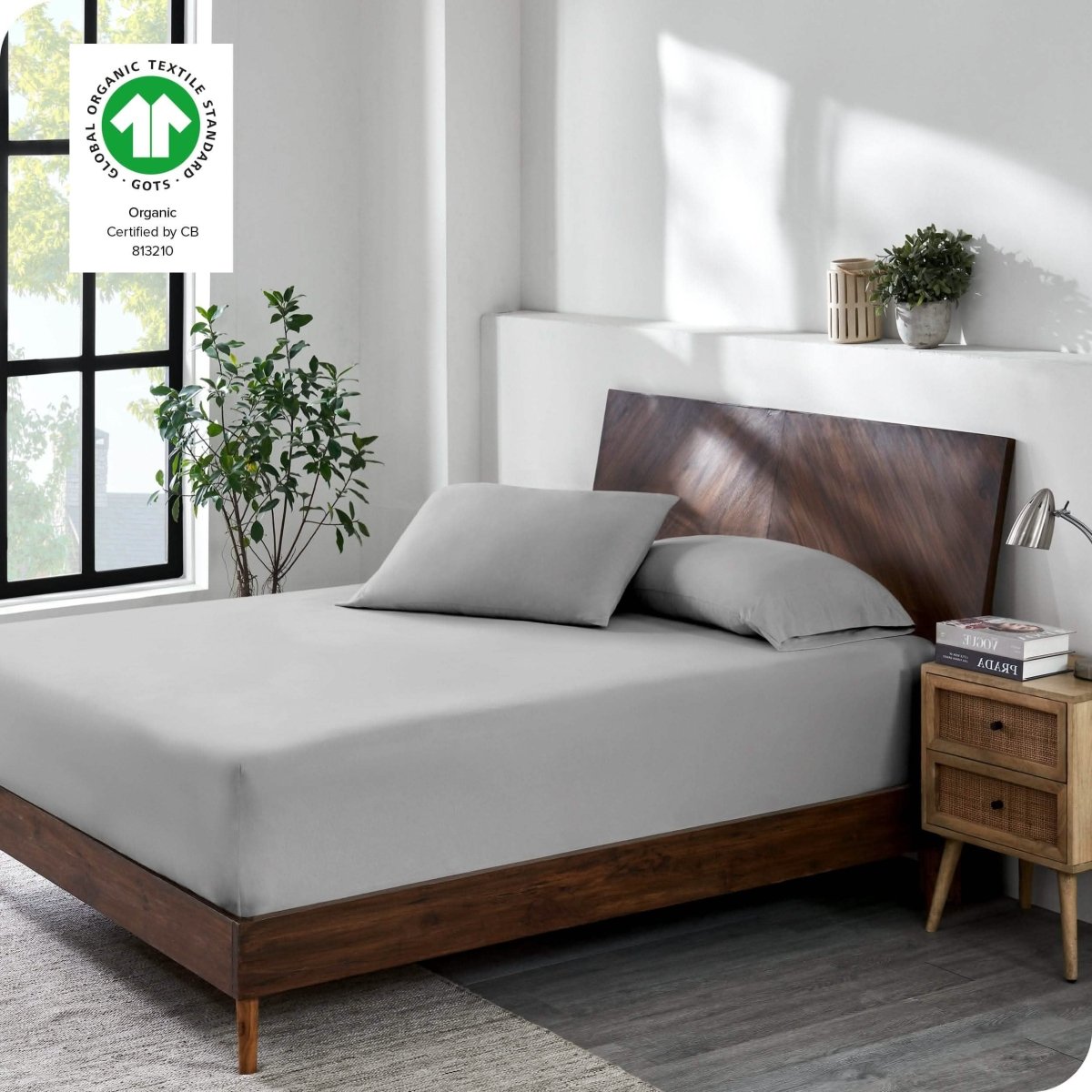 A modern bedroom with a jersey fitted sheet on the mattress with matching pillowcases
