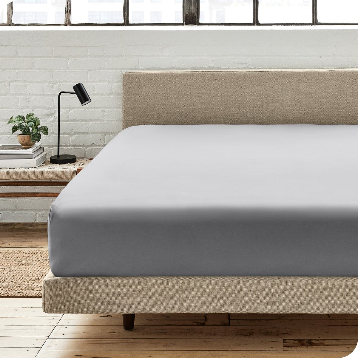 Modern bedroom with a fitted sheet which fits deep mattresses up to 15 inches
