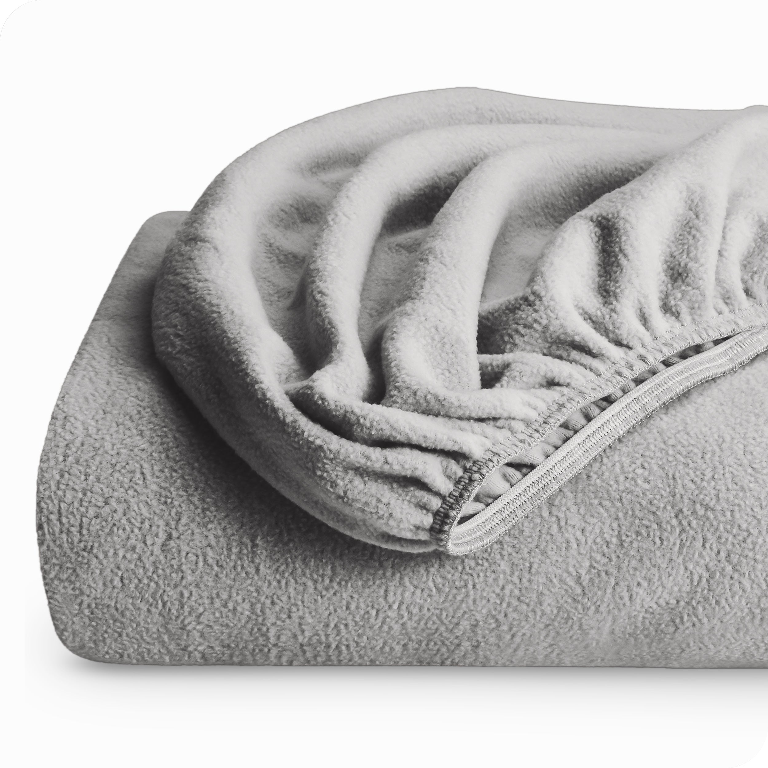 A folded polar fleece fitted sheet.