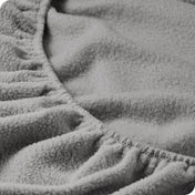 Close up of the elastic portion of a fleece fitted sheet