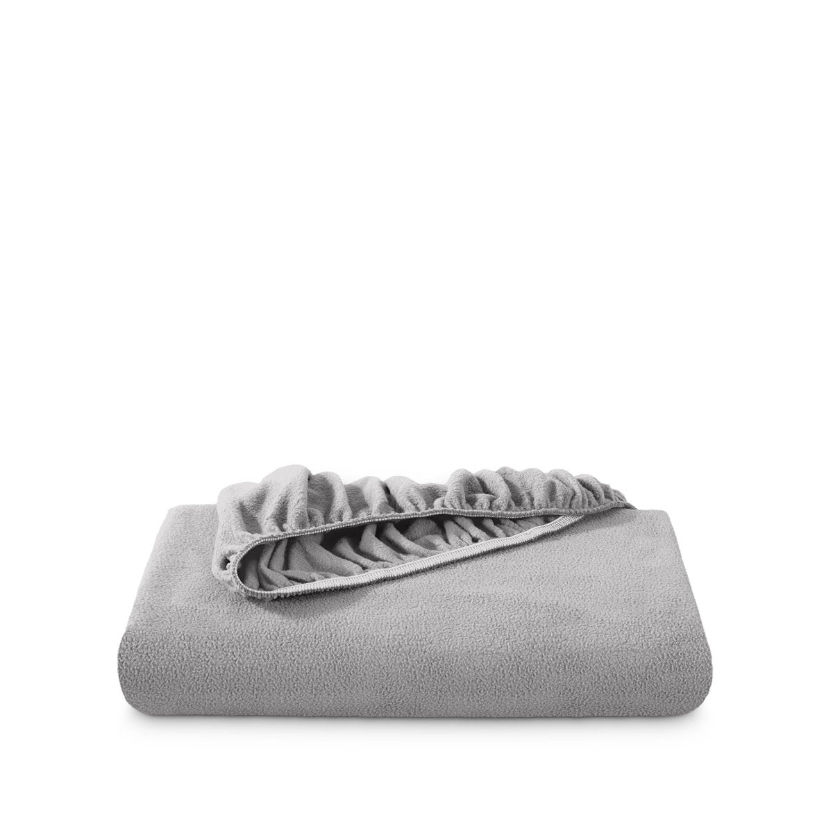 Polar fleece fitted sheet folded on a white background