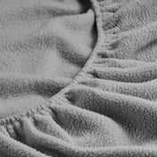 Close-up of a fitted sheet with all around elastic