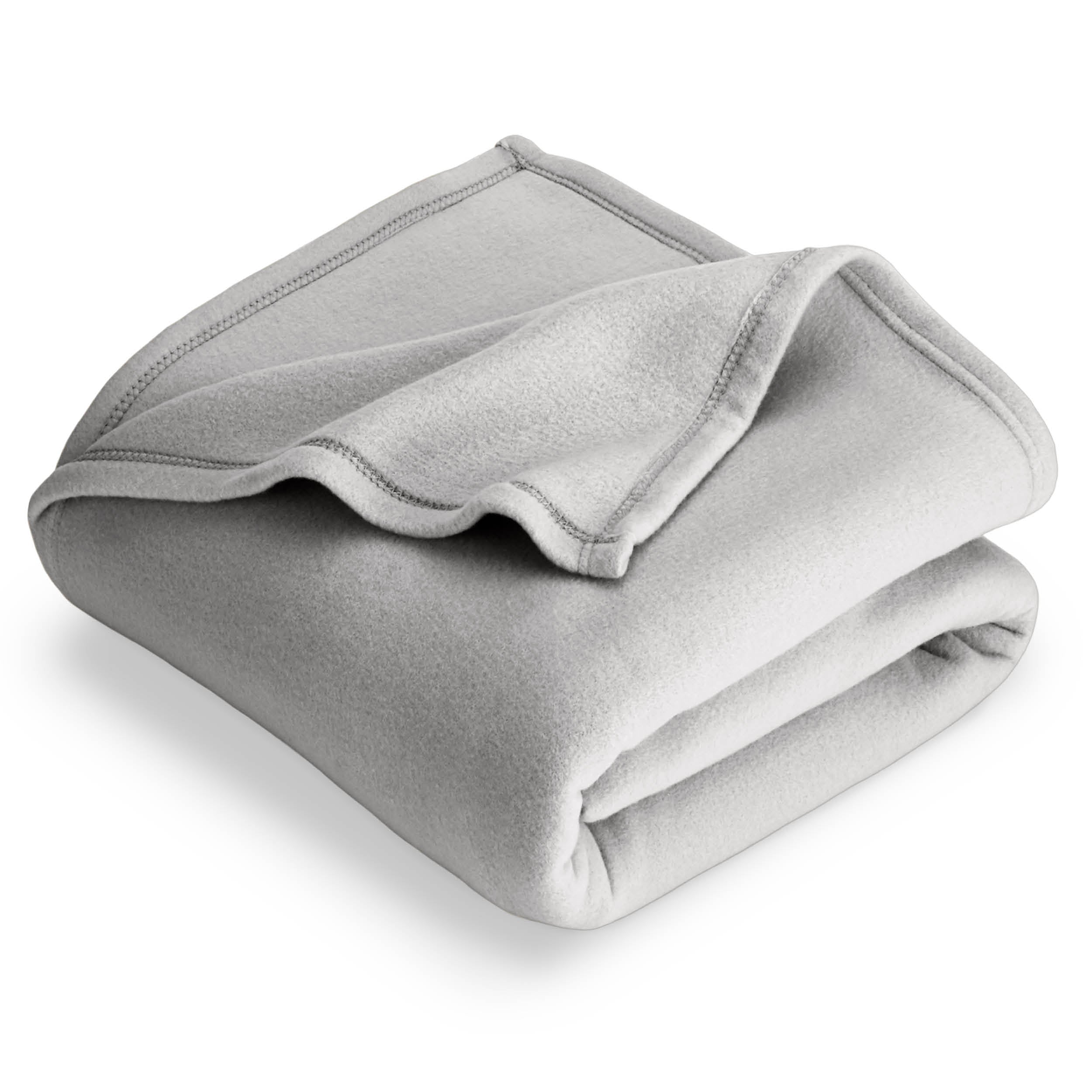 Light grey polar fleece blanket folded with 1 corner folded back