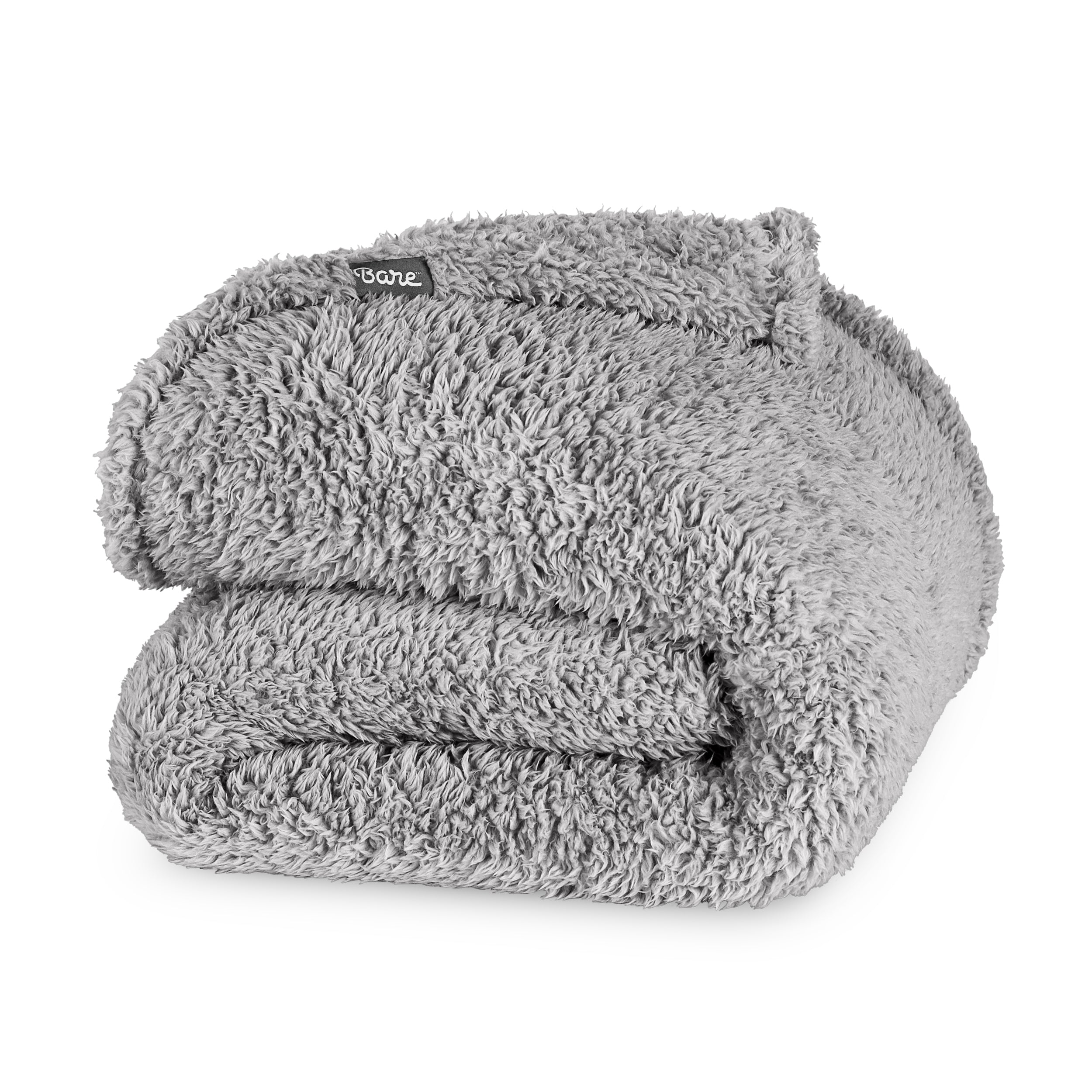 Folded textured blanket with a brand label on a white background