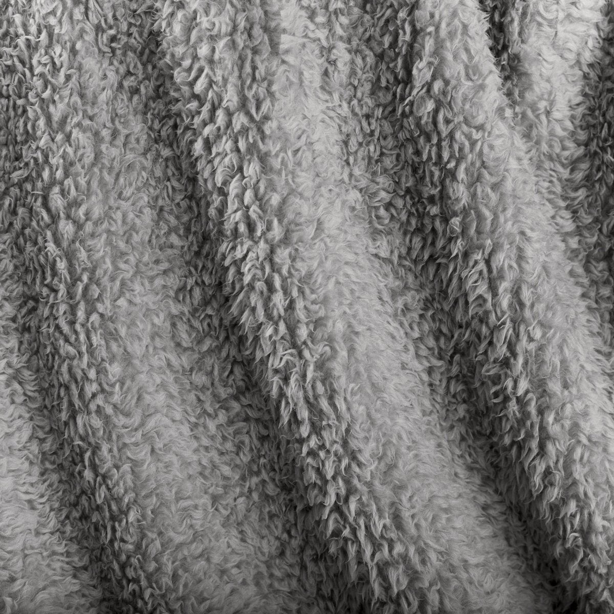 Close-up of textured faux shearling blanket
