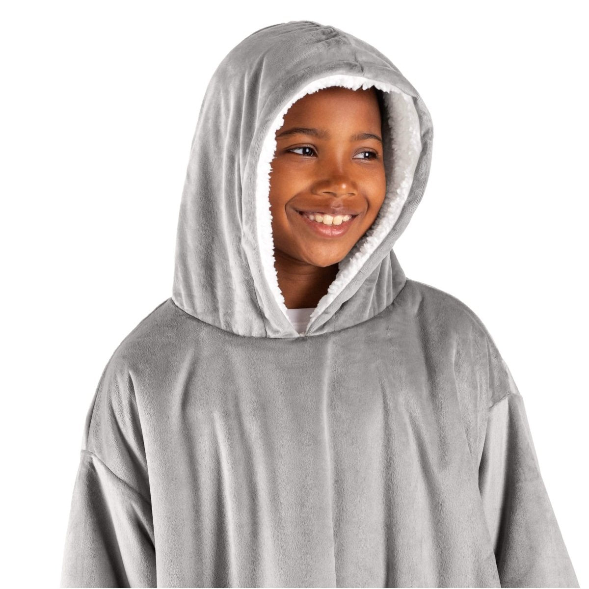 A child with a wearable blanket on