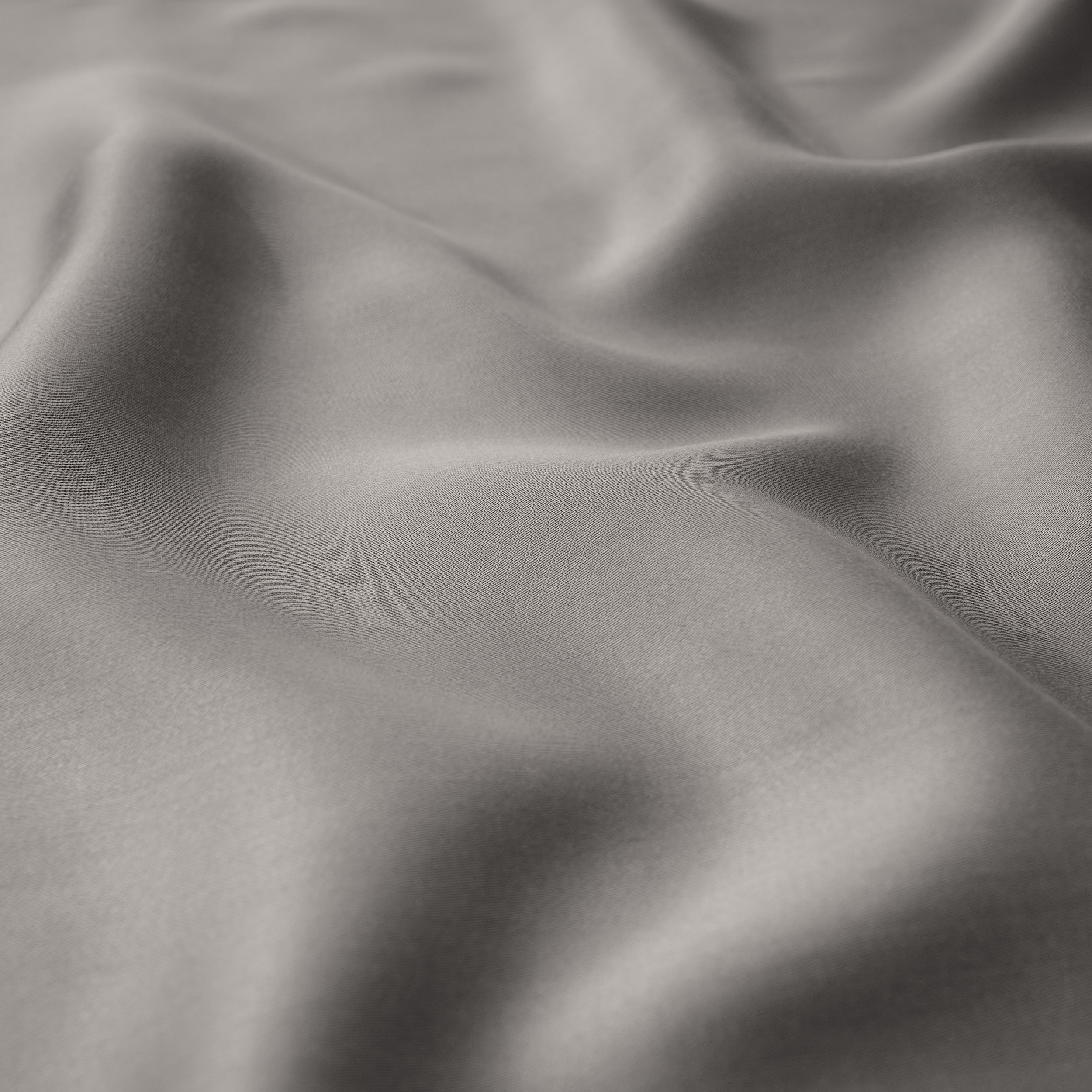 Close-up of gray fabric with folds