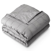 A folded cotton weighted blanket with a white background