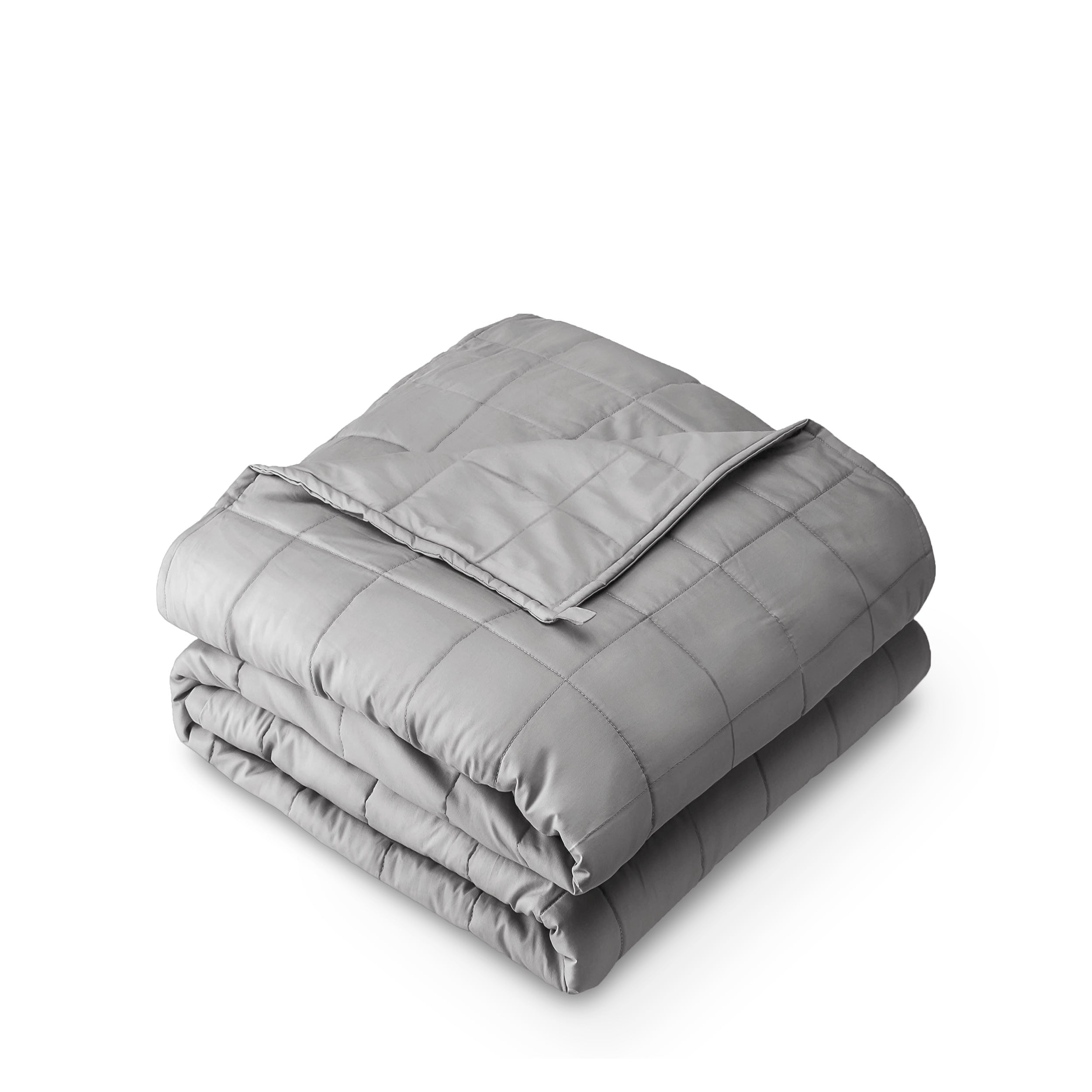 A folded cotton weighted blanket with a white background