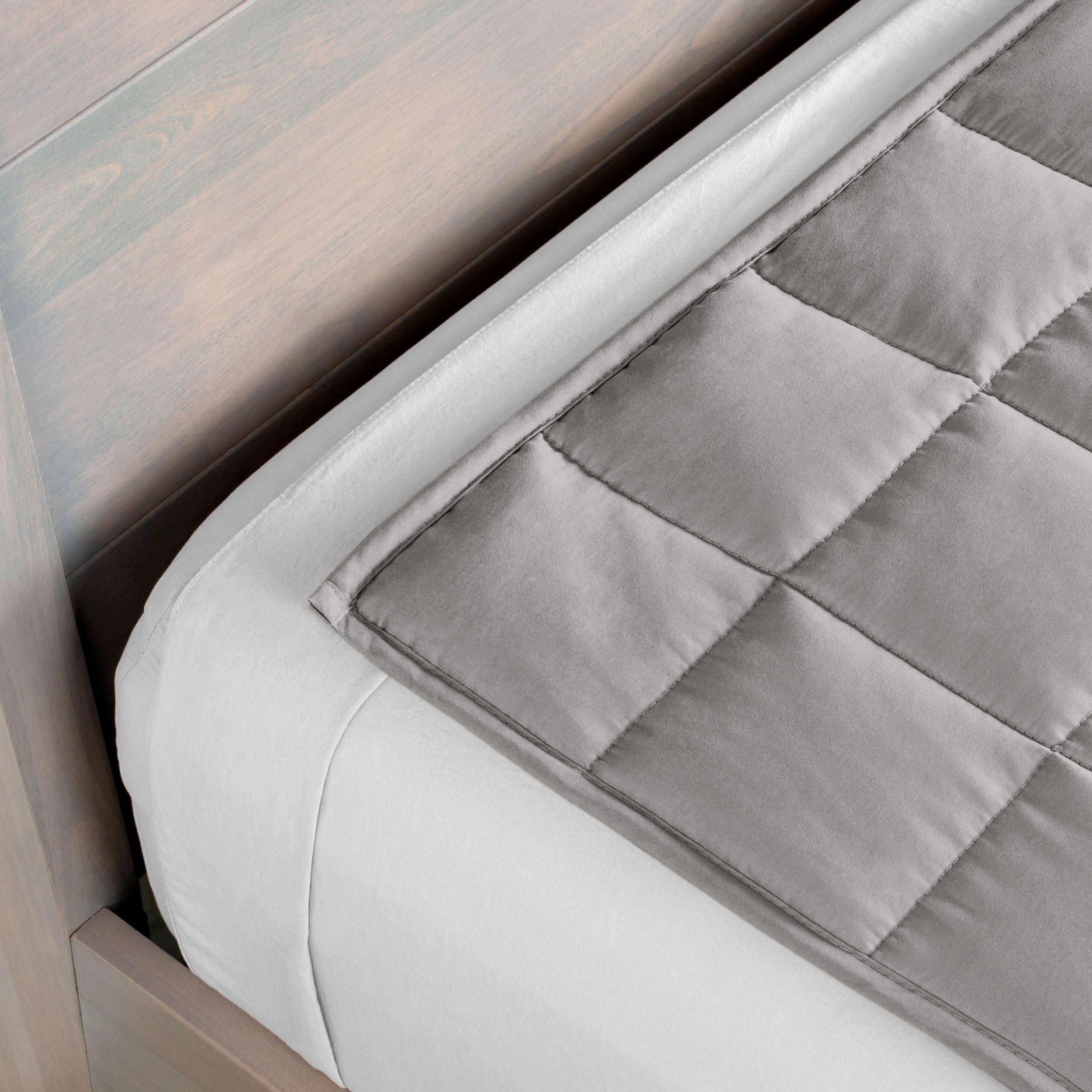 Close-up of a weighted blanket on a bed