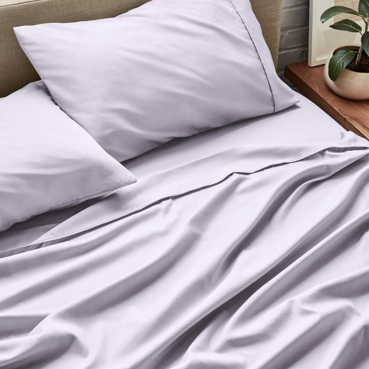 Close up of ultra-soft sheets on a bed