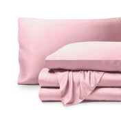 Bamboo pillowcases and sheets set on a white background
