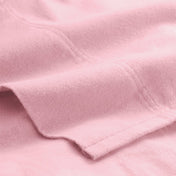 Close-up of flannel fabric with a focus on texture and color.