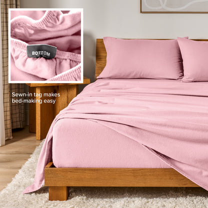 Flannel sheets on a with an inset of a sewn-in tag reading BOTTOM