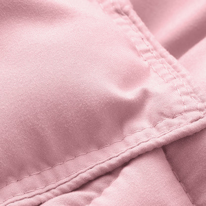 Close-up of comforter fabric with stitching detail