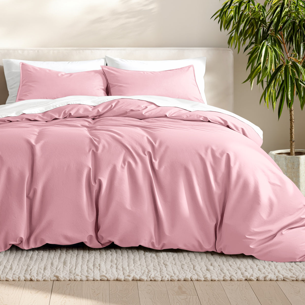 Microfiber bedding set on a bed with a neutral background