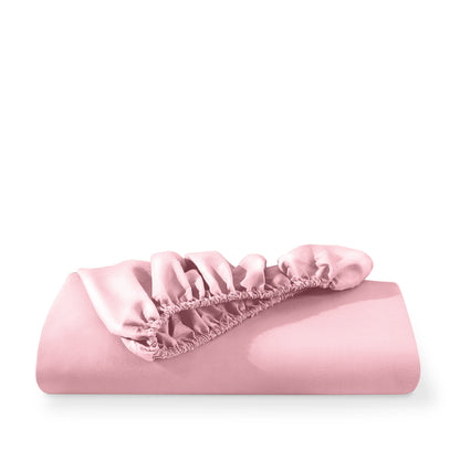 Microfiber fitted sheet folded with a white background