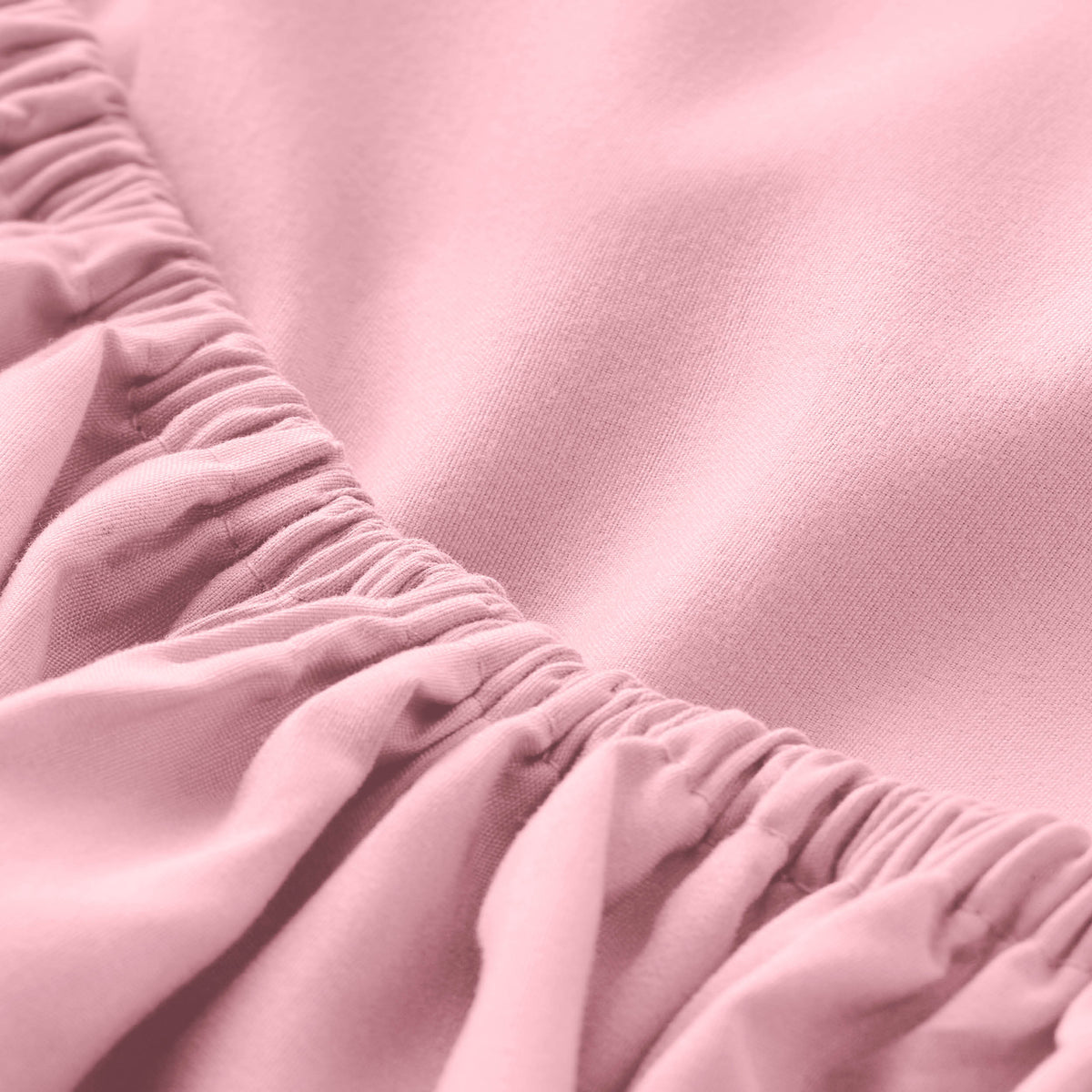 Close-up of fitted sheet with all around elastic
