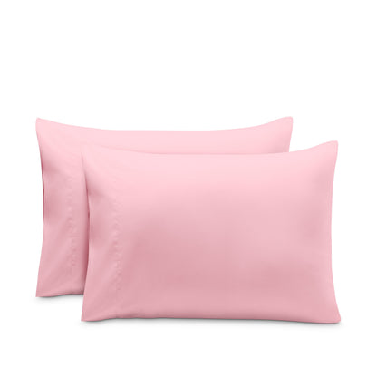 2 pillowcases on pillows
