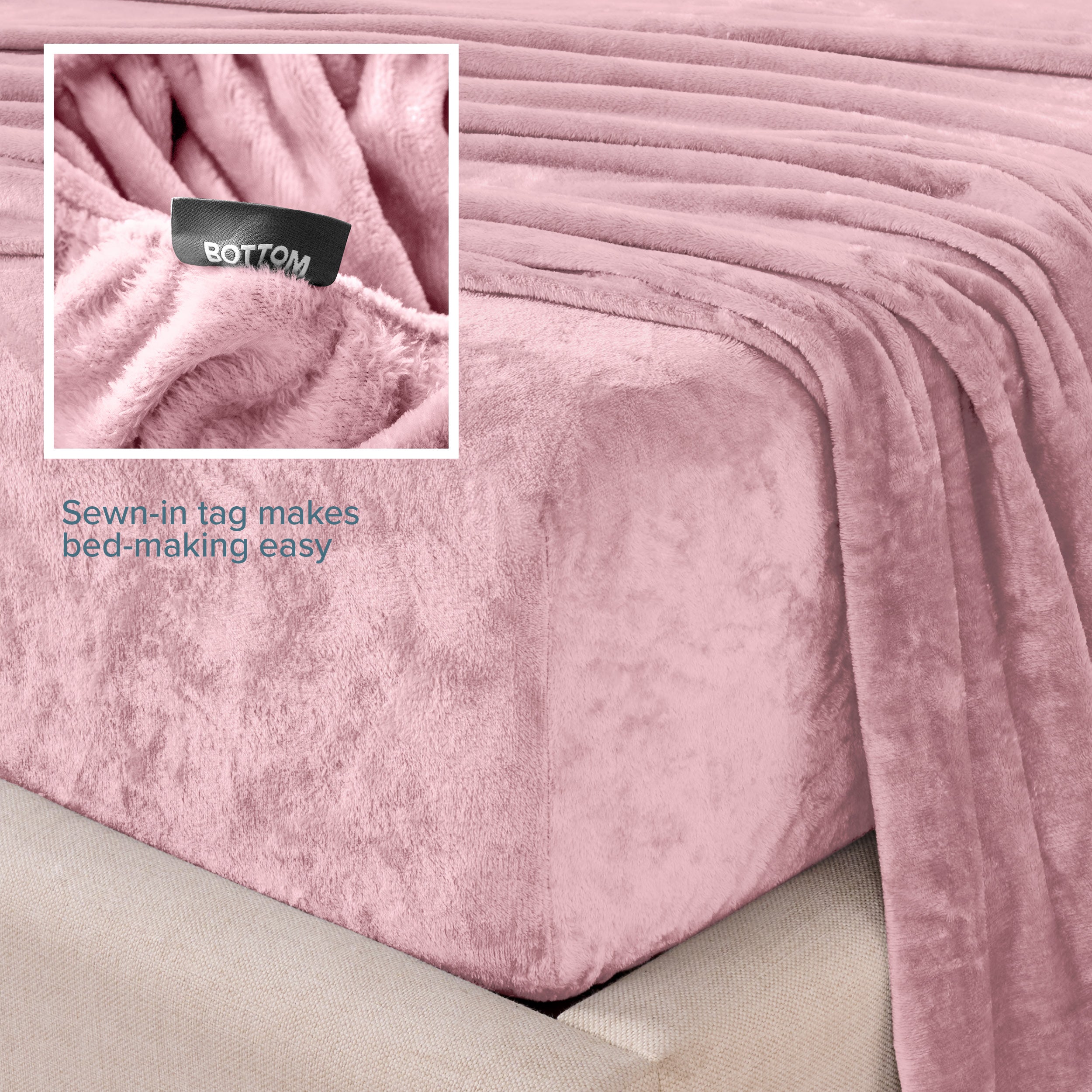 Close-up of the corner of a bed made with microplush sheets