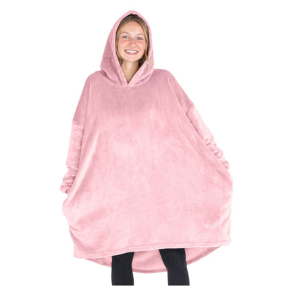 A woman wearing a cozy hooded blanket