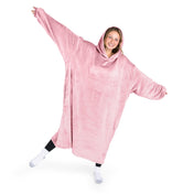 A woman has a hooded wearable blanket on