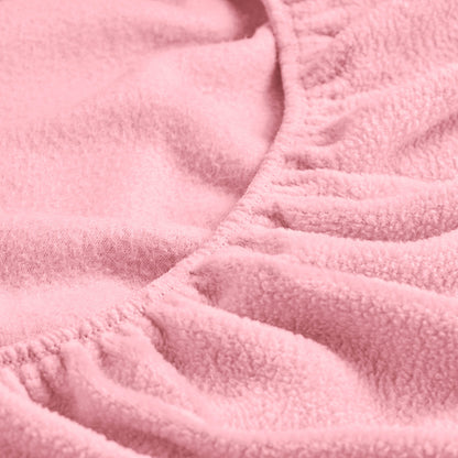 Close-up of a fitted sheet with all around elastic