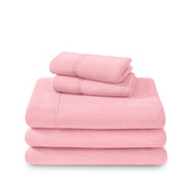 Polar fleece sheets and pillowcases folded and stacked on a white background