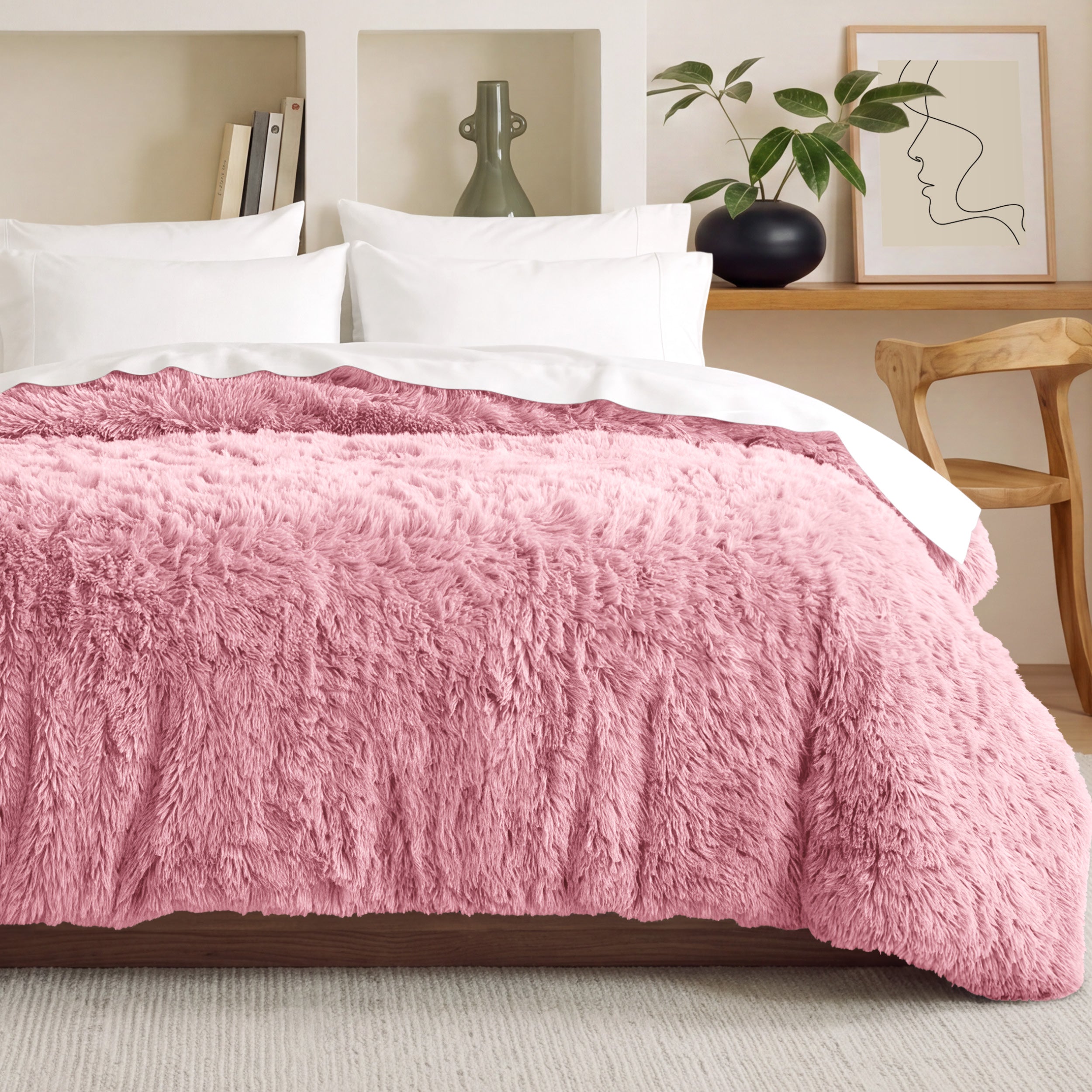 Shaggy duvet on a bed in a bedroom setting with decor elements.