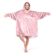 An adult with a sherpa wearable blanket on