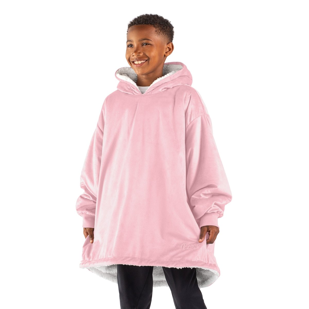 A child with a sherpa wearable blanket on