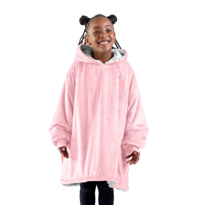 A child with a sherpa wearable blanket on