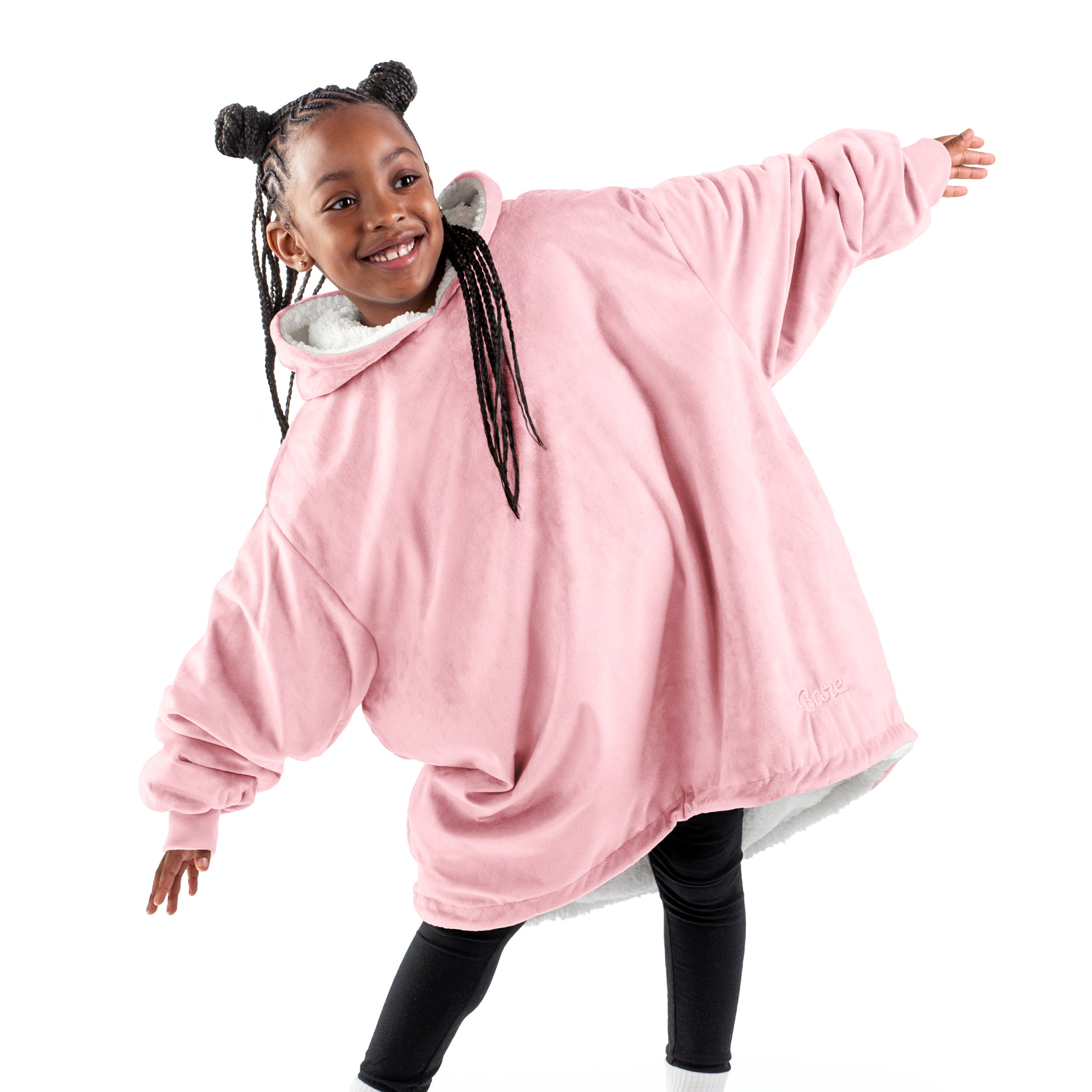 A child with a wearable blanket on