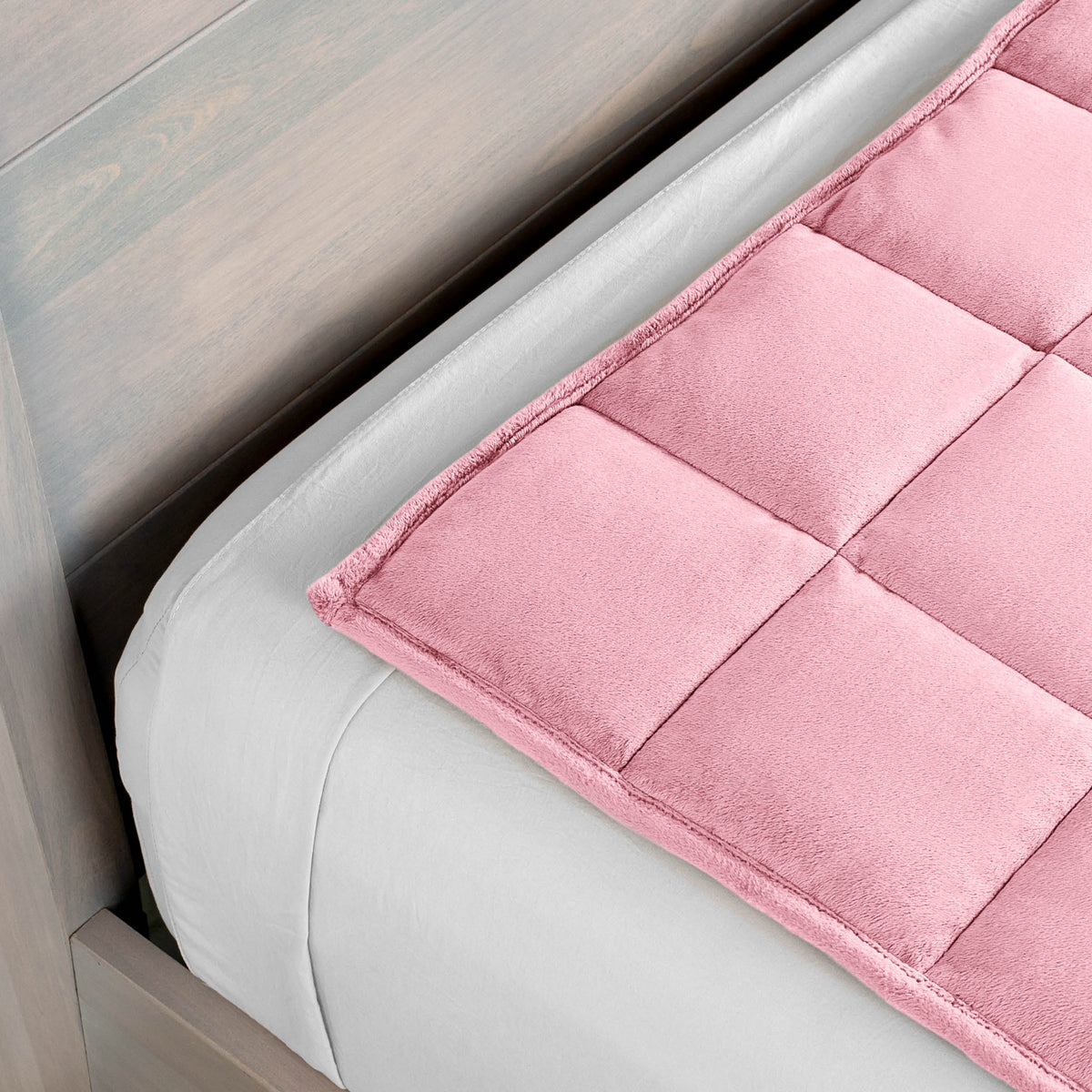 Close-up of a weighted blanket on a bed