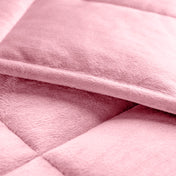 Close-up of a weighted blanket showing the stitching and texture