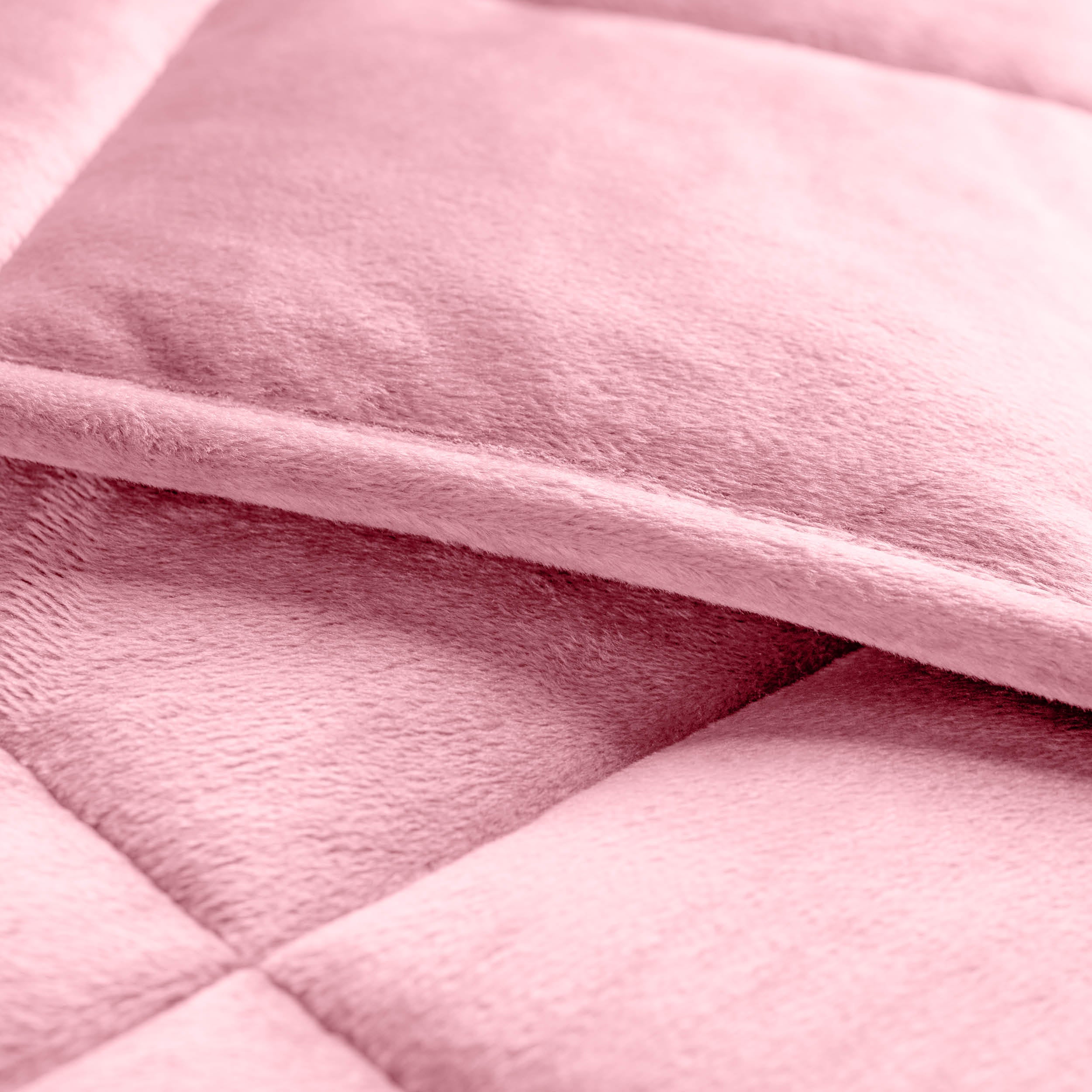 Close-up of a weighted blanket showing the stitching and texture