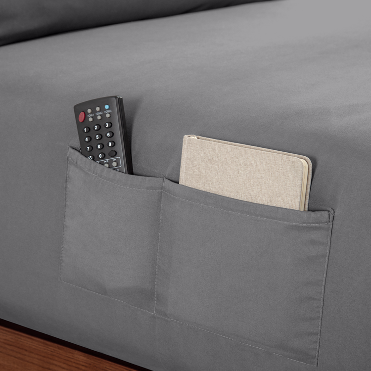 Gray fabric with a pocket holding a remote control and a book