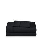 Set of bed sheets folded on a white background